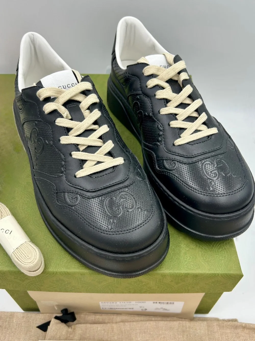Men’s Gucci GG Embossed Leather Sneakers.  Size 9.5.(fits 10.5). Made in Italy.
